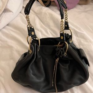 SOLD. Vintage Juicy Couture. Black Leather with gold accents